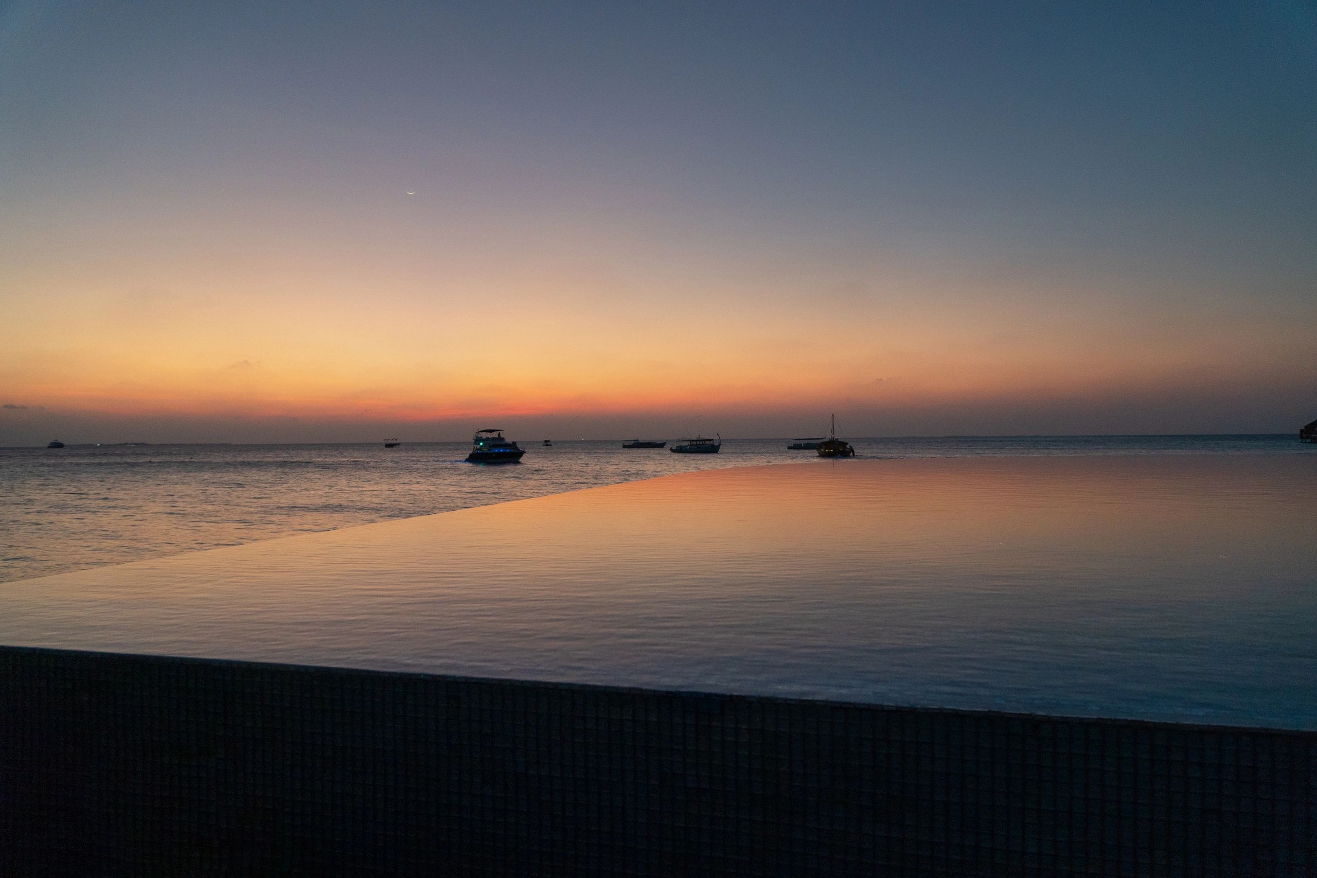 Sunset resort setting for leisure hotel escapes