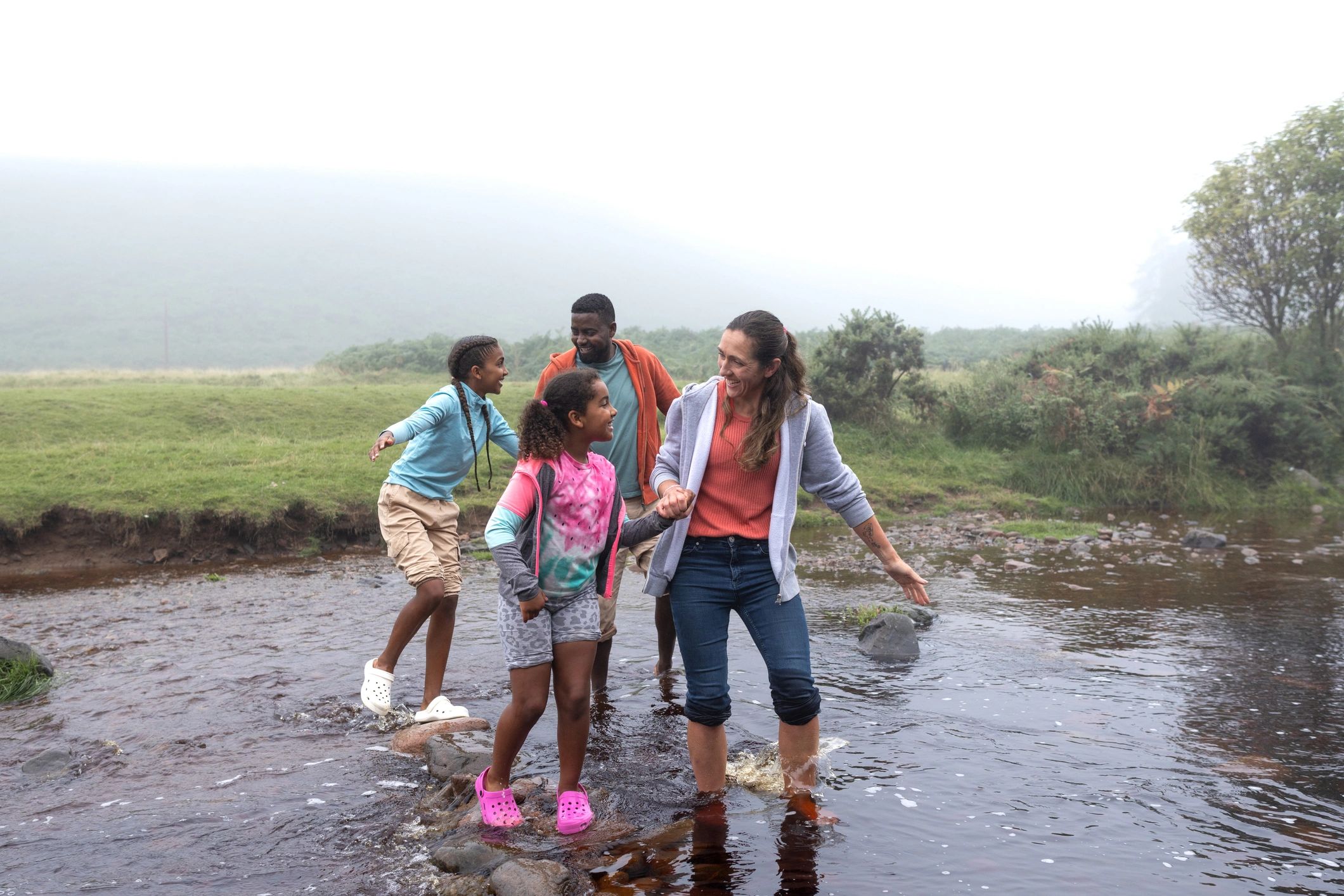 Family exploring outdoors on an adventure