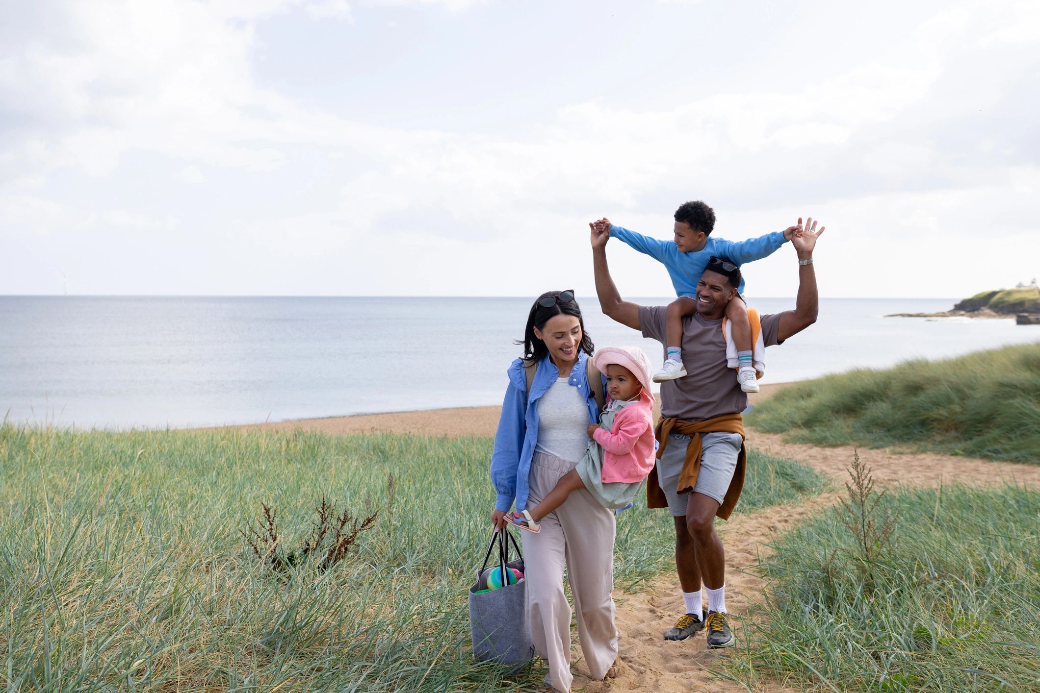 Family walking near the beach on vacation