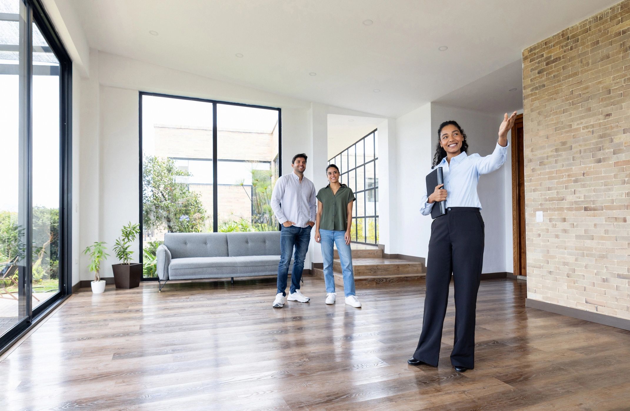 Advisor presenting premium property and service solutions to clients